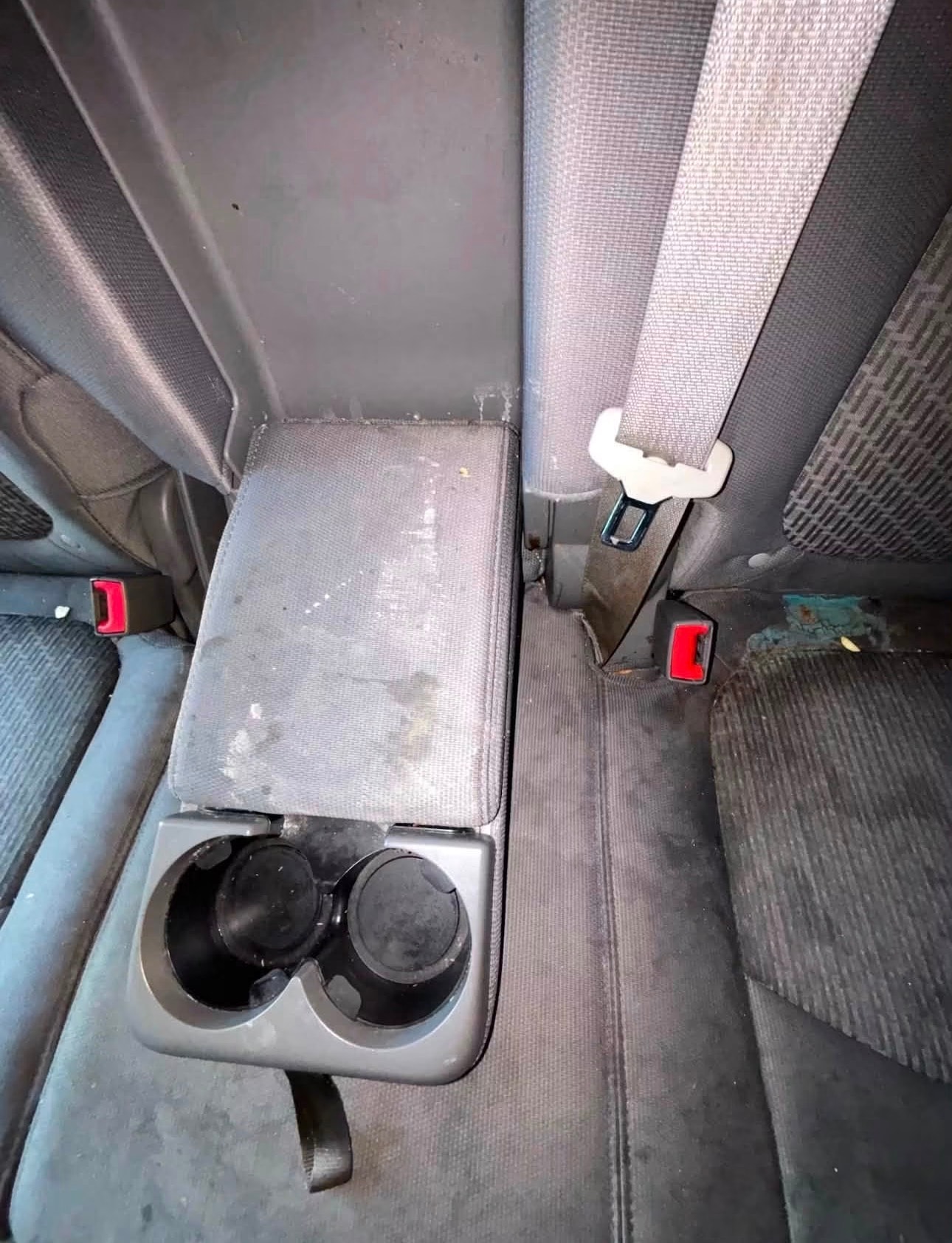 Before detailing — dirty backseat cup holders